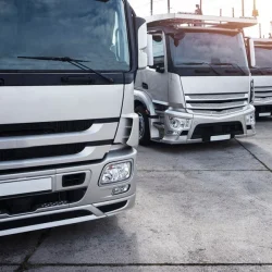 group-trucks-parked-row_342744-533